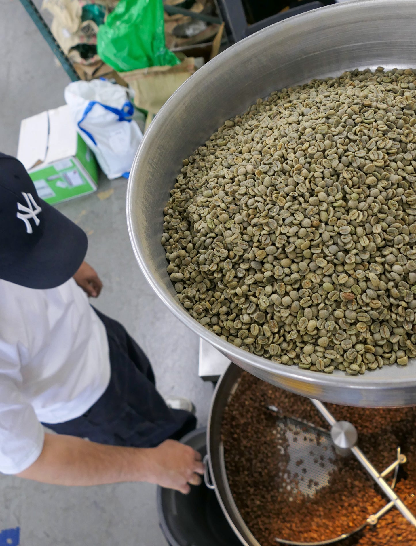 green bean coffee and roasted coffee in the coffee roaster