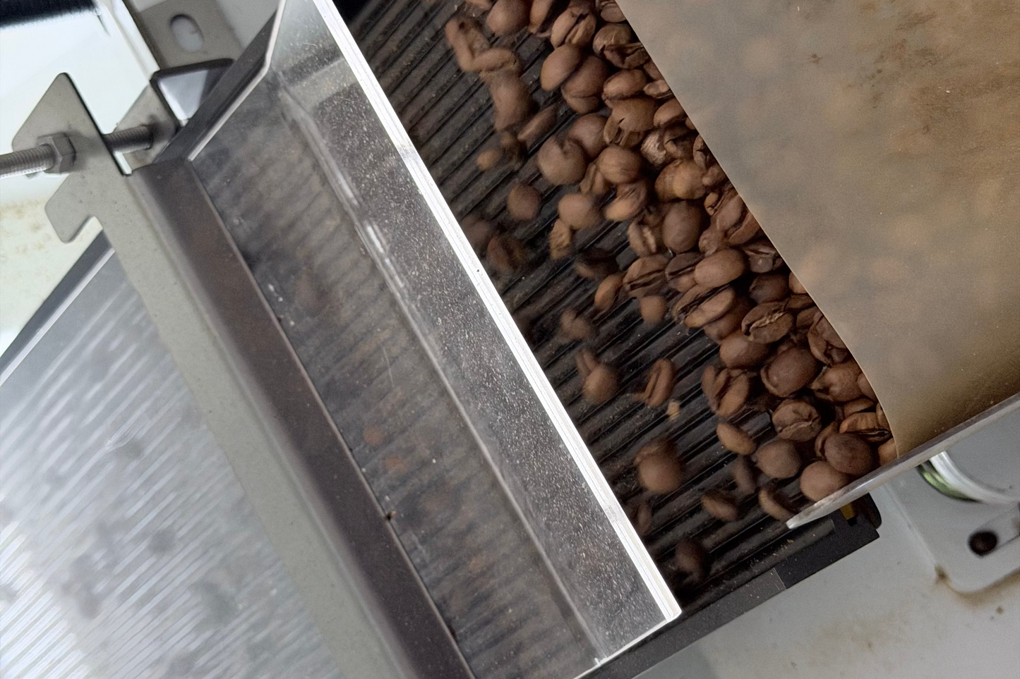 Coffee beans being processed in a coffee roaster