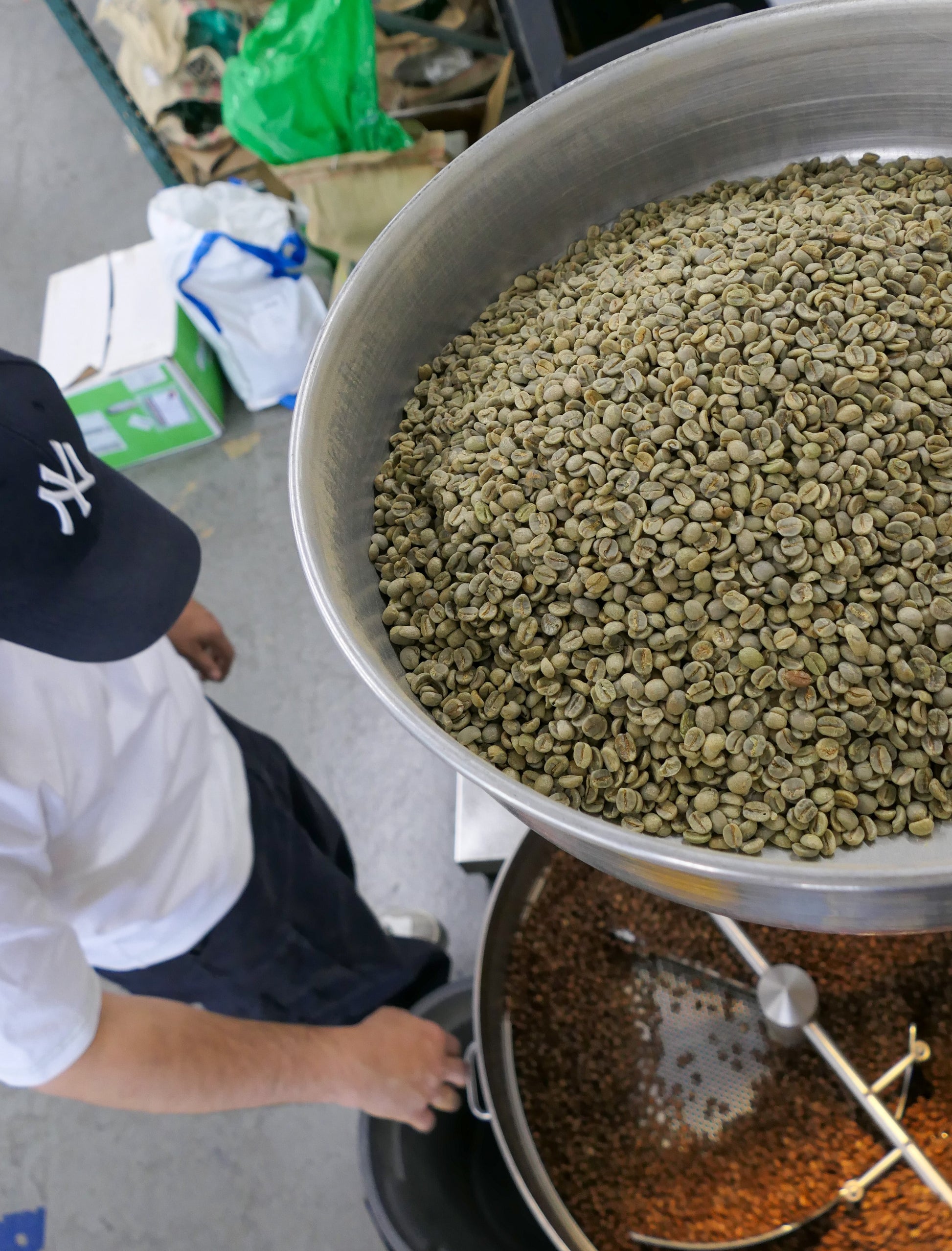 green bean coffee and roasted coffee in the coffee roaster