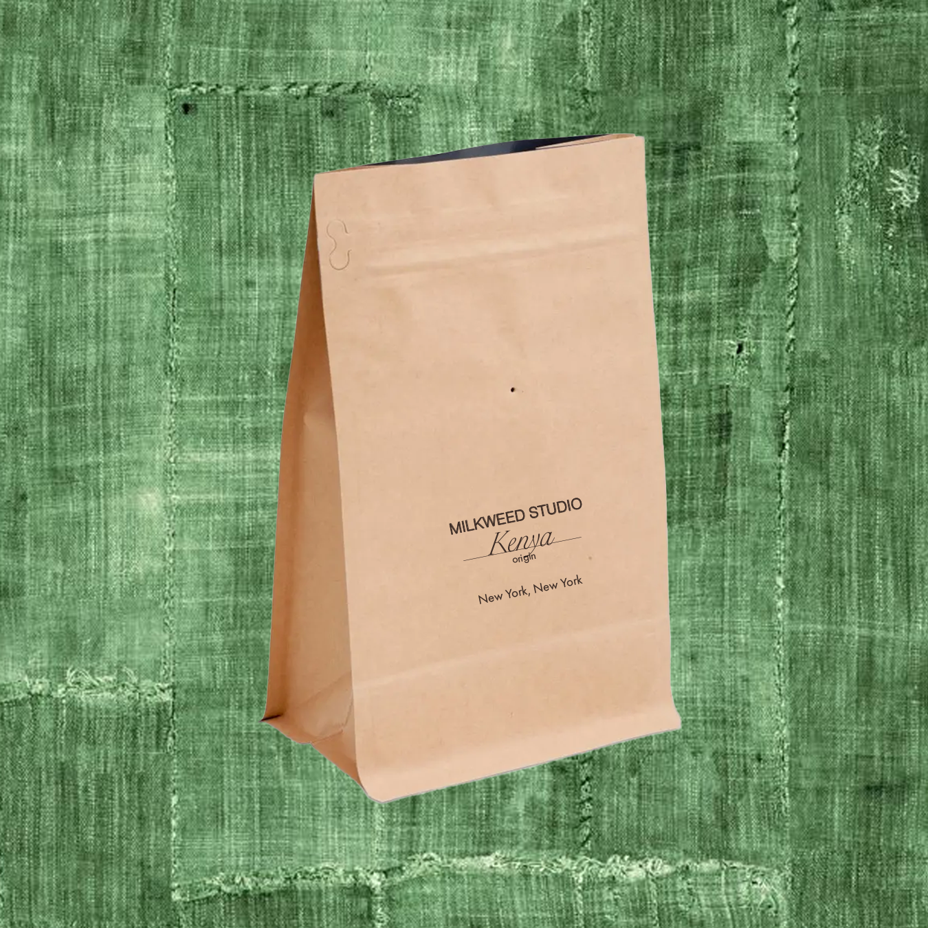 a 12 oz Kraft bag of coffee with a textured green background